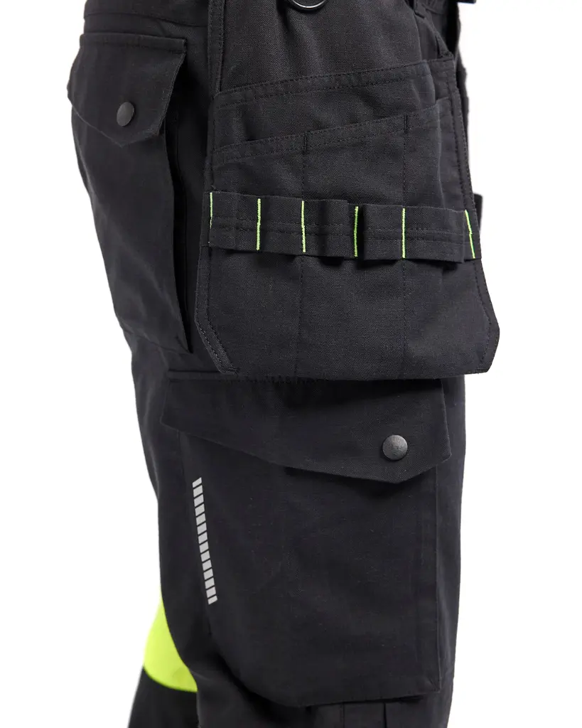710815129933_Inherent_Multinorm_Dames_Pocketbroek_Zwart_Geel_Rechterzijde_Detail.webp
